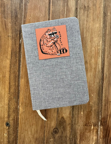 Scrappy Raccoon - Patched Notebook