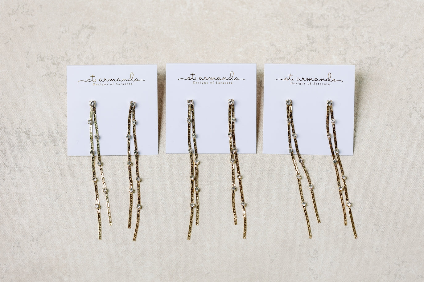 Gold Dotted Duster Earrings