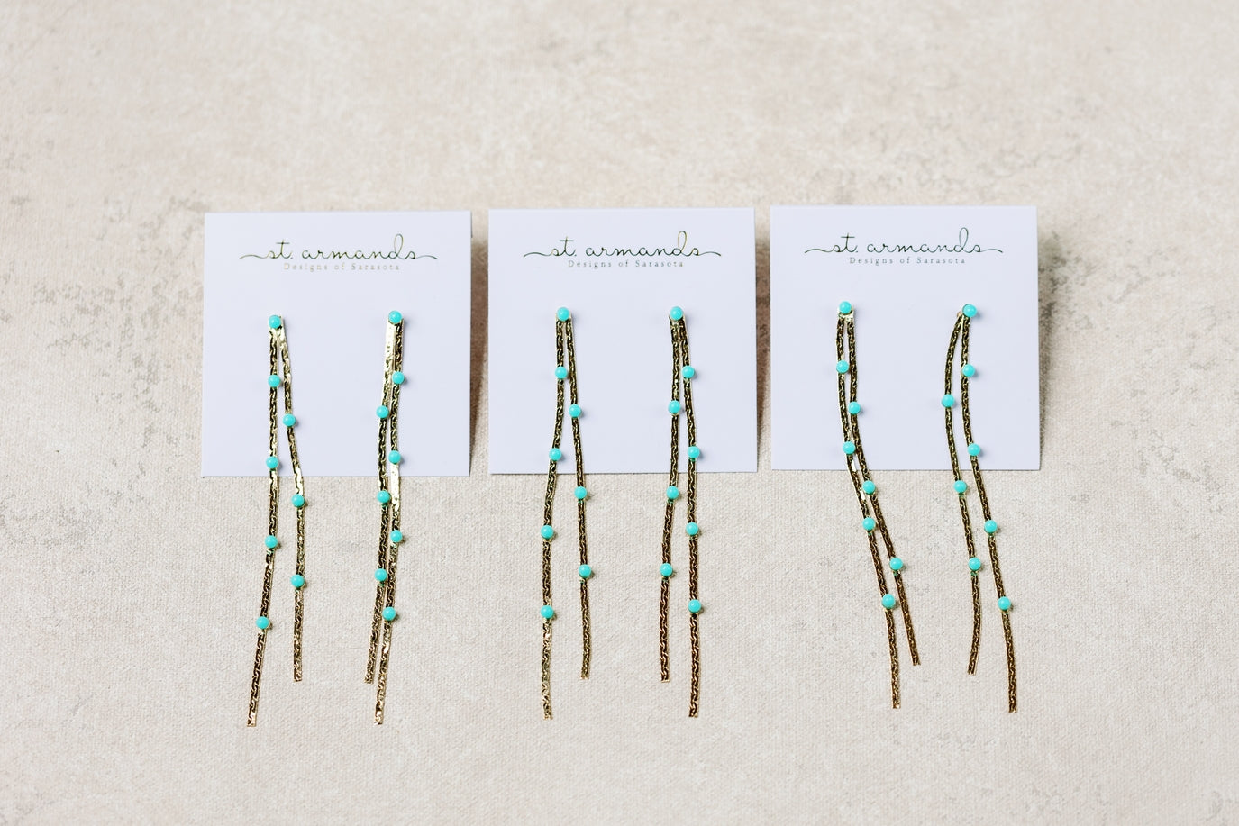 Gold Dotted Duster Earrings